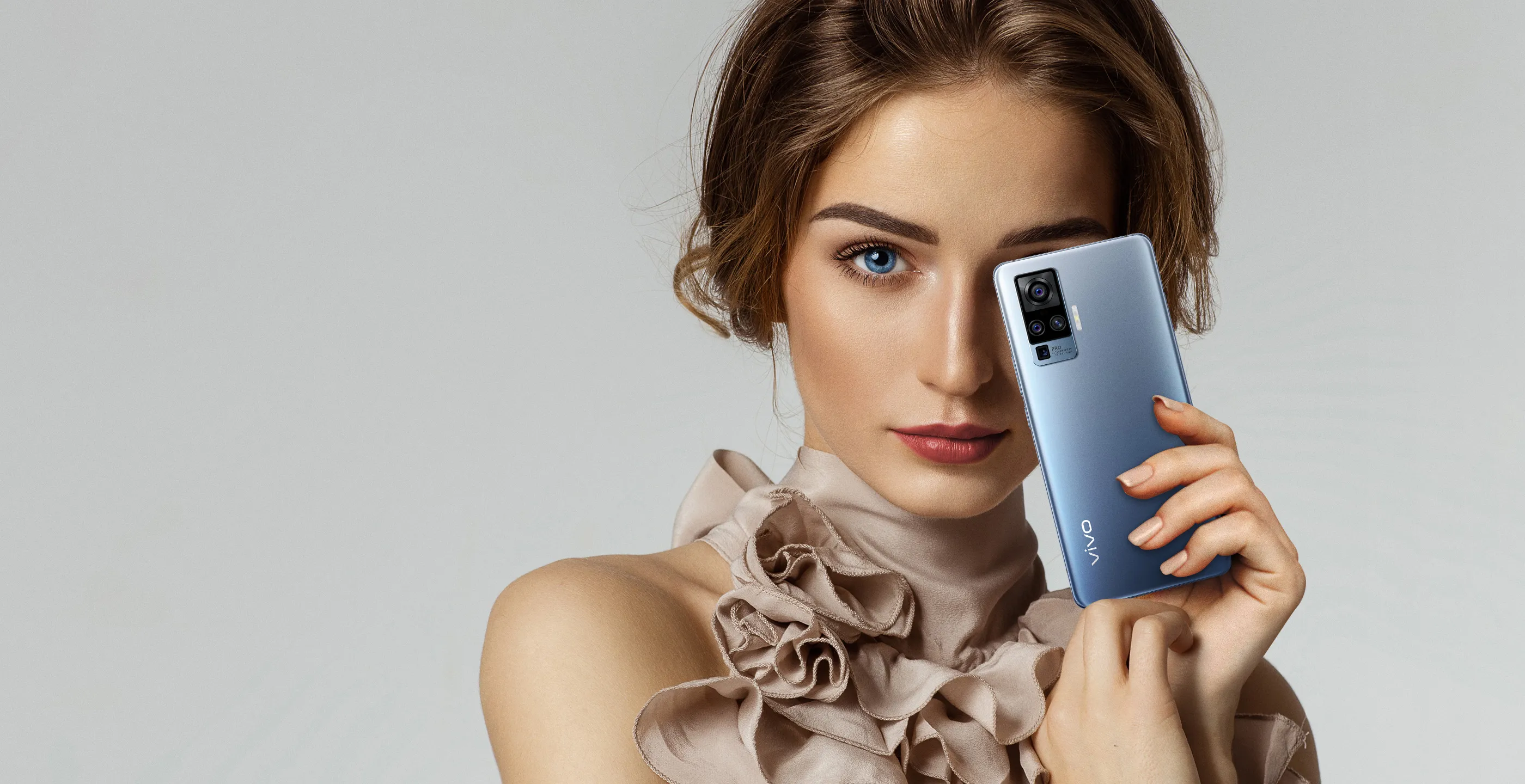 A lady holding a phone